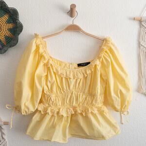 O.P.I. Yellow Smocked Peplum Blouse